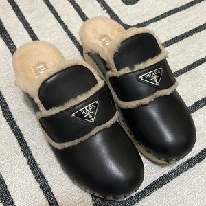 Prada shearling clogs